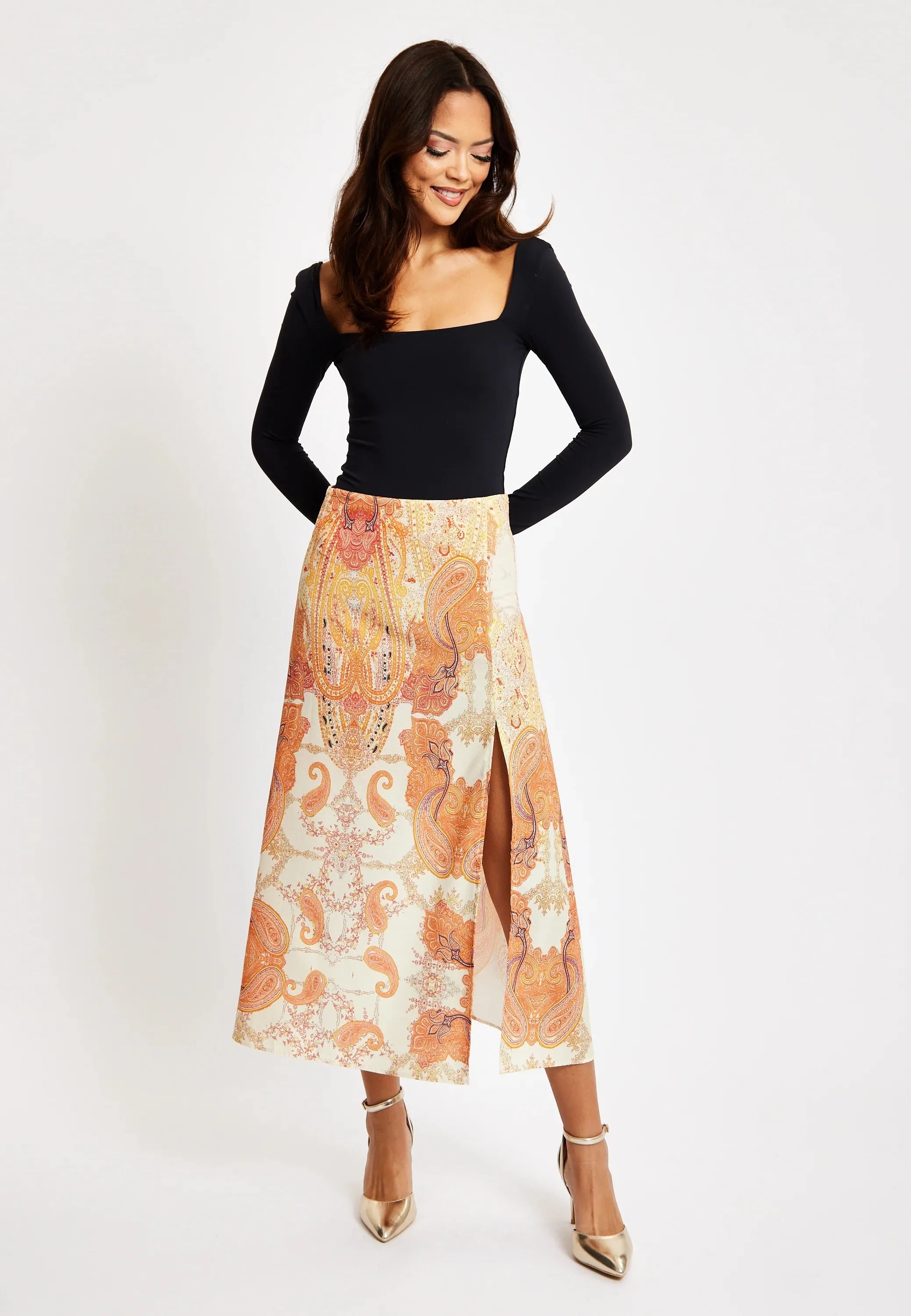 Women's Orange Abstract Print Midi Skirt with Front Slit for Holidays - Liquorish